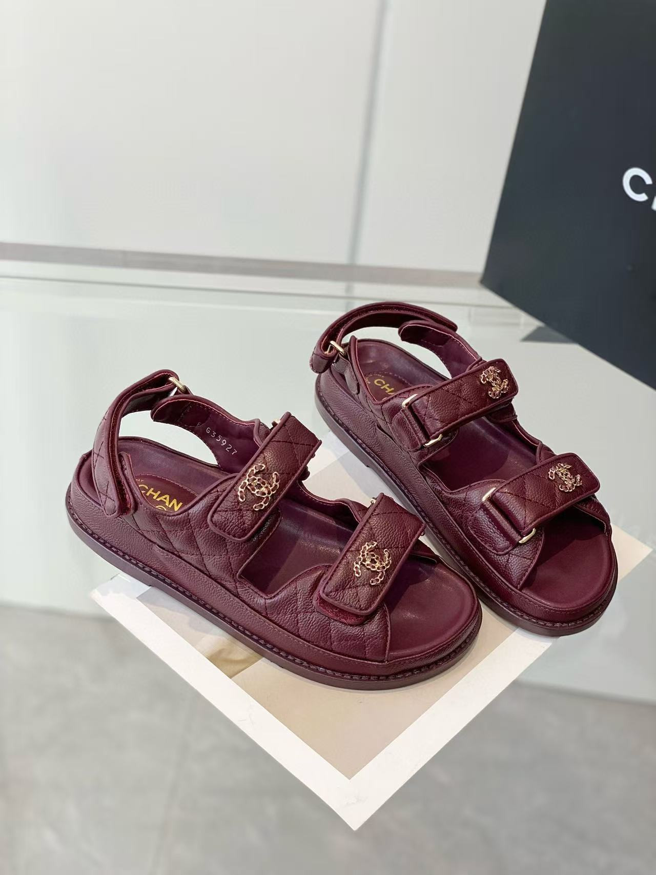 ua Ch*el sandals