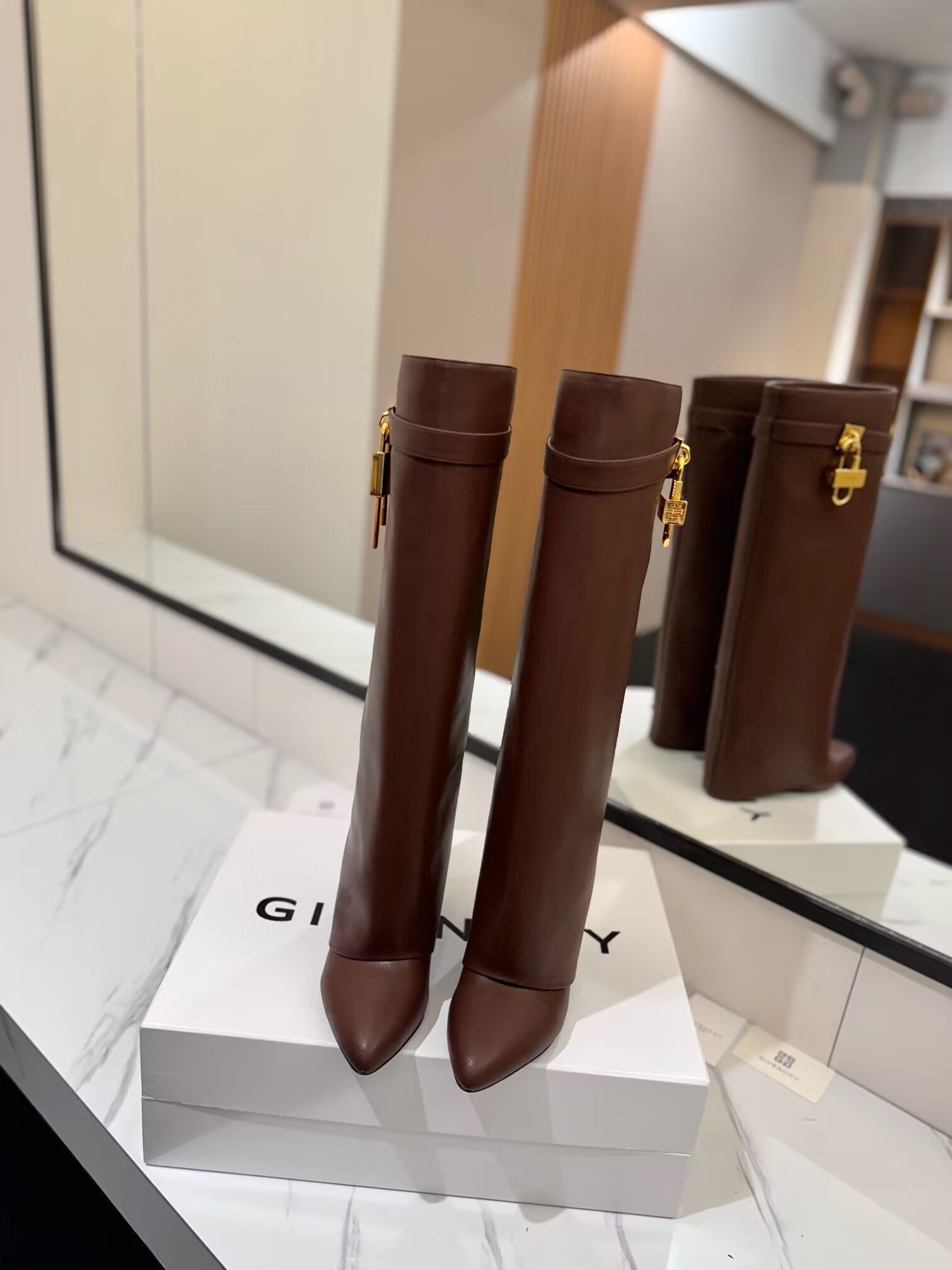 UA Givenchy Shark Lock boots in leather