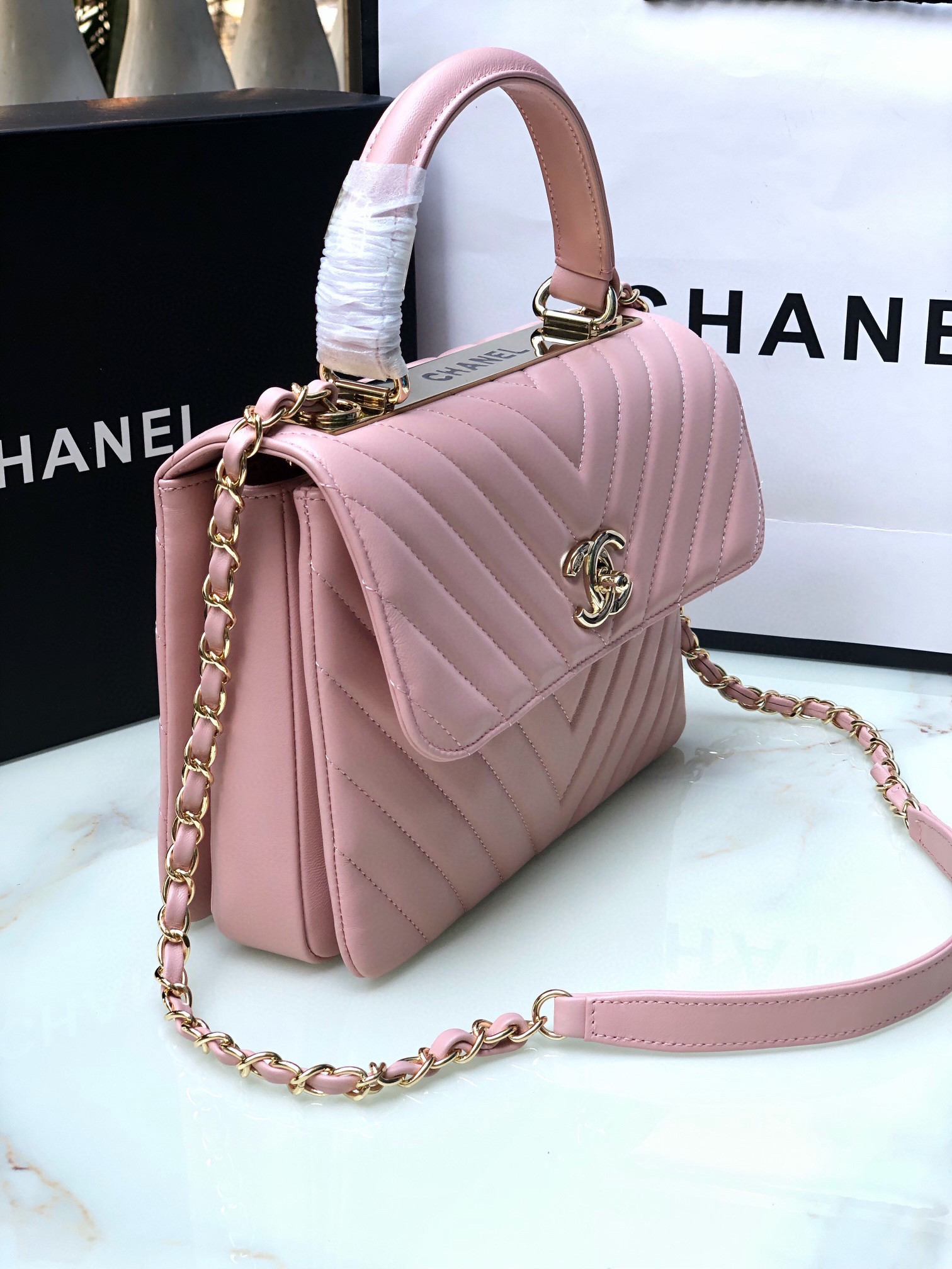 Ch*el flap bag with top handle pink 6.6 × 9.8 × 4.7 in